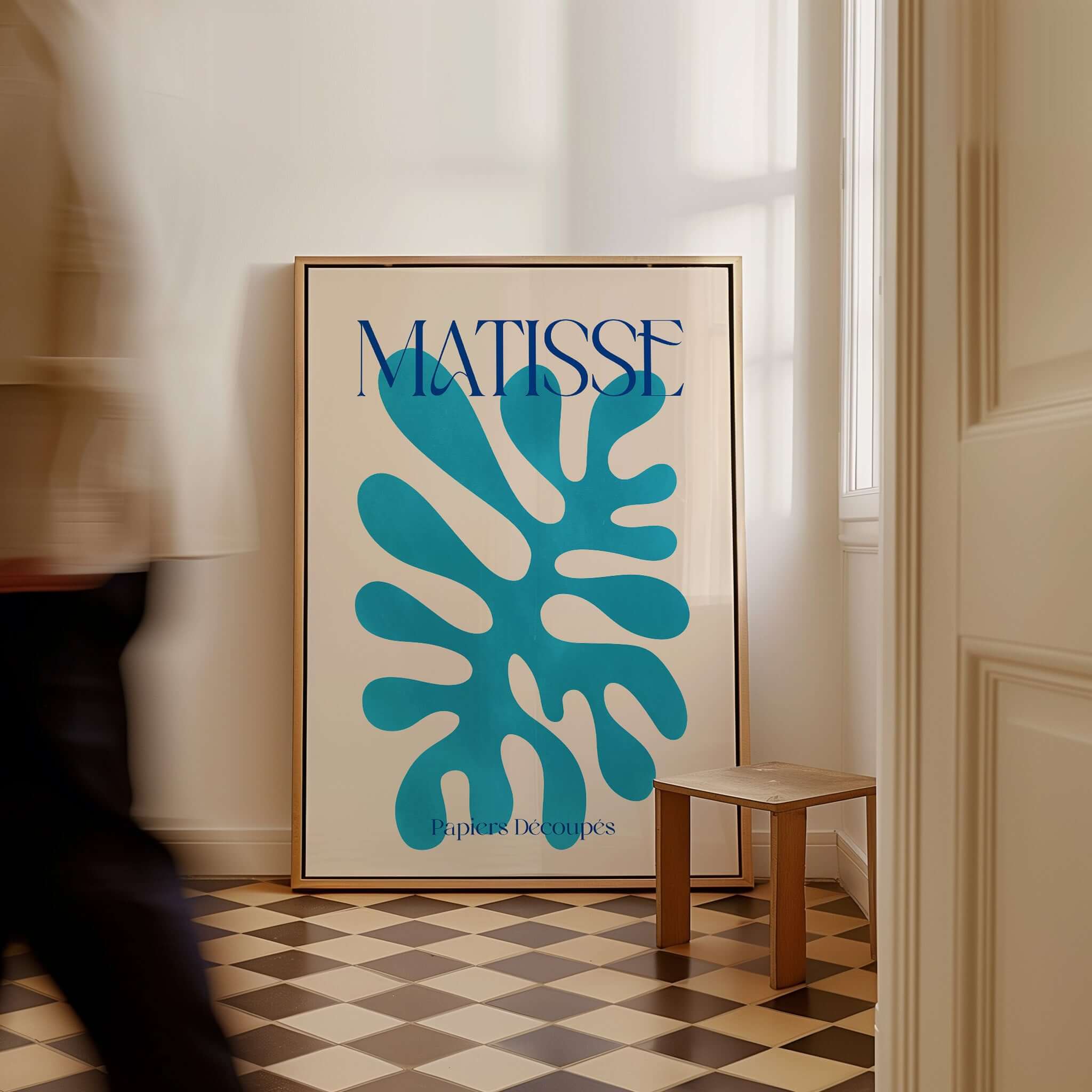 Matisse Cyan Blue Abstract Shape Papiers Découpés Poster displayed in a stylish interior with a checkered floor.