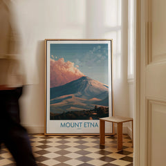 Framed Mount Etna travel poster leaning on wall in sunlit hallway with checkered floor
