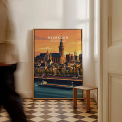 Framed Nijmegen Netherlands city skyline travel poster leaning against wall on tiled floor