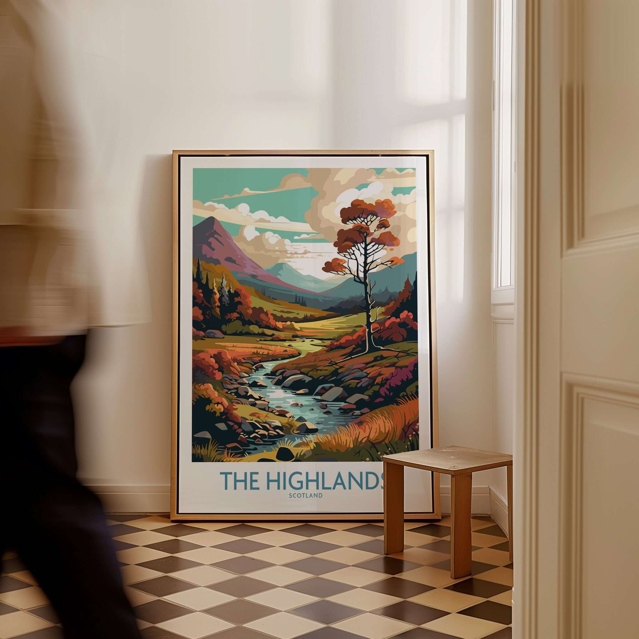 The Highlands Scotland Art Print displayed in a stylish home interior featuring vibrant colors and serene landscapes.