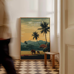 Sri Lanka Wall Art Print | Sunset Elephant Landscape Travel Poster displayed in a stylish room with a person walking by.