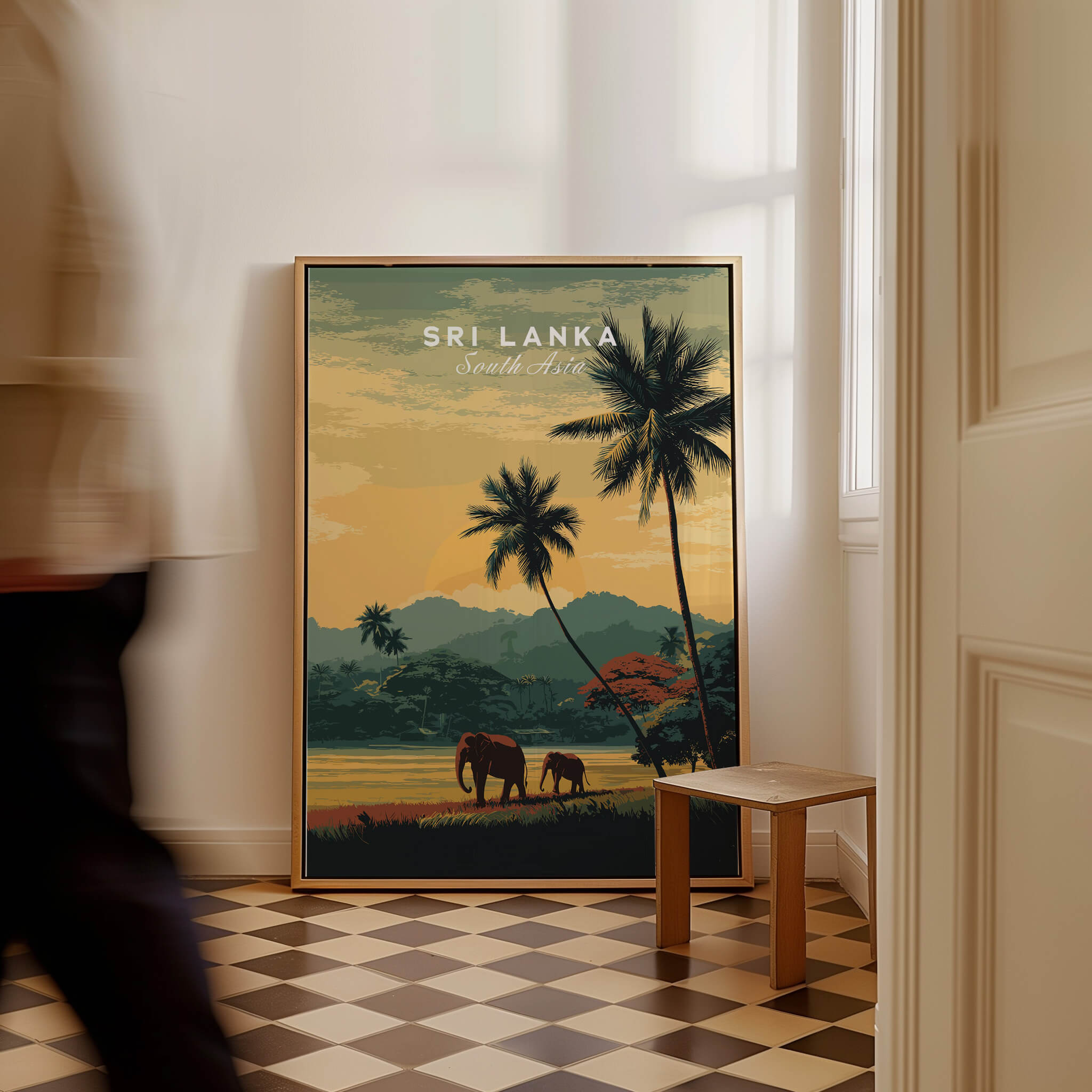 Sri Lanka Wall Art Print | Sunset Elephant Landscape Travel Poster displayed in a stylish room with a person walking by.