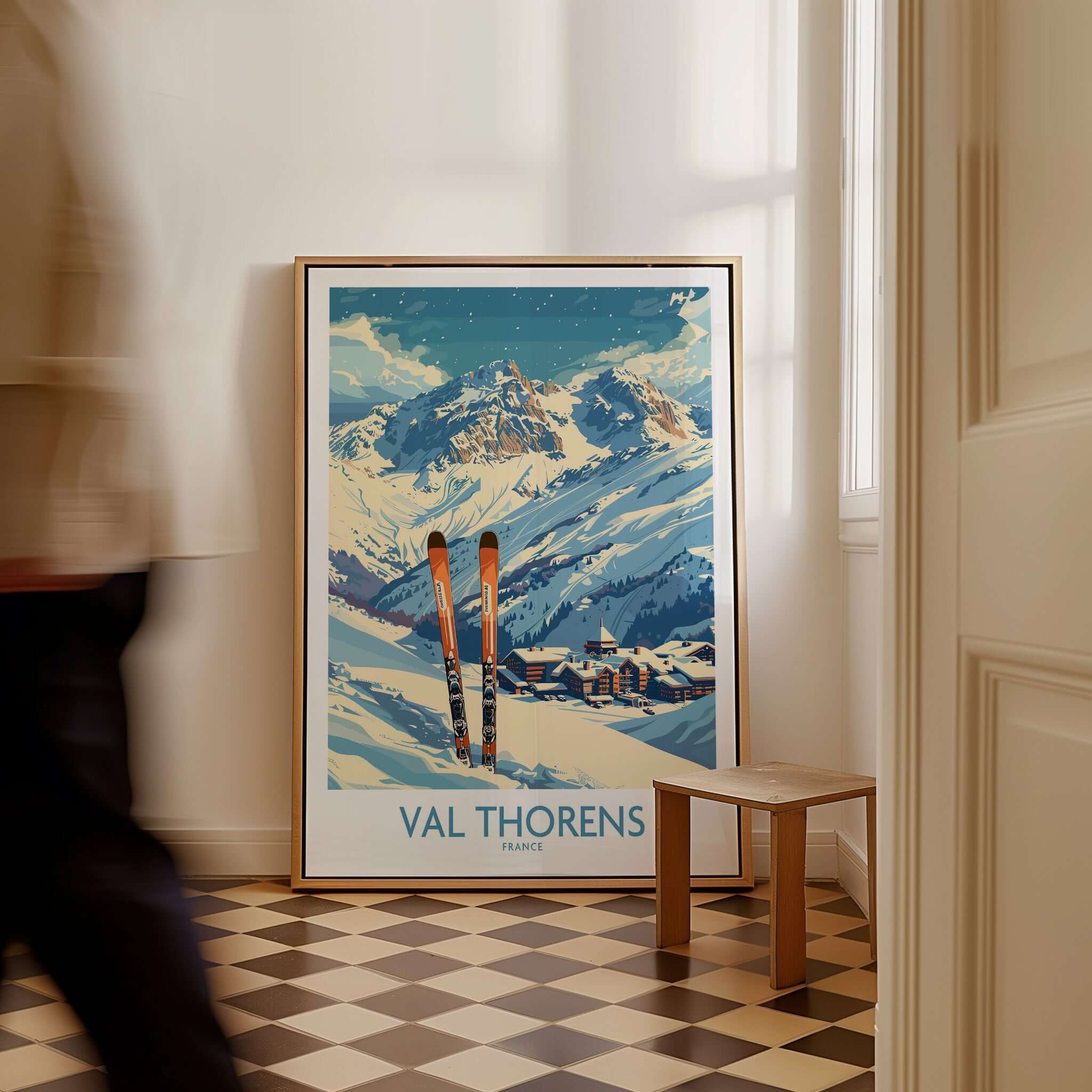 Val Thorens Print featuring a stunning skiing scene with snow-capped mountains and ski equipment in a stylish interior.
