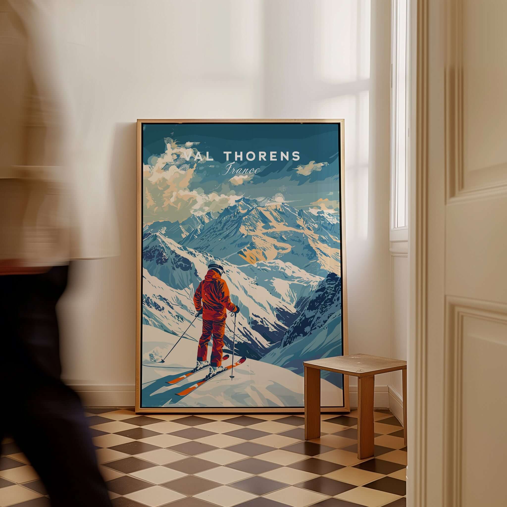 Val Thorens Poster featuring a skier against a backdrop of majestic snowy mountains in a stylish interior.