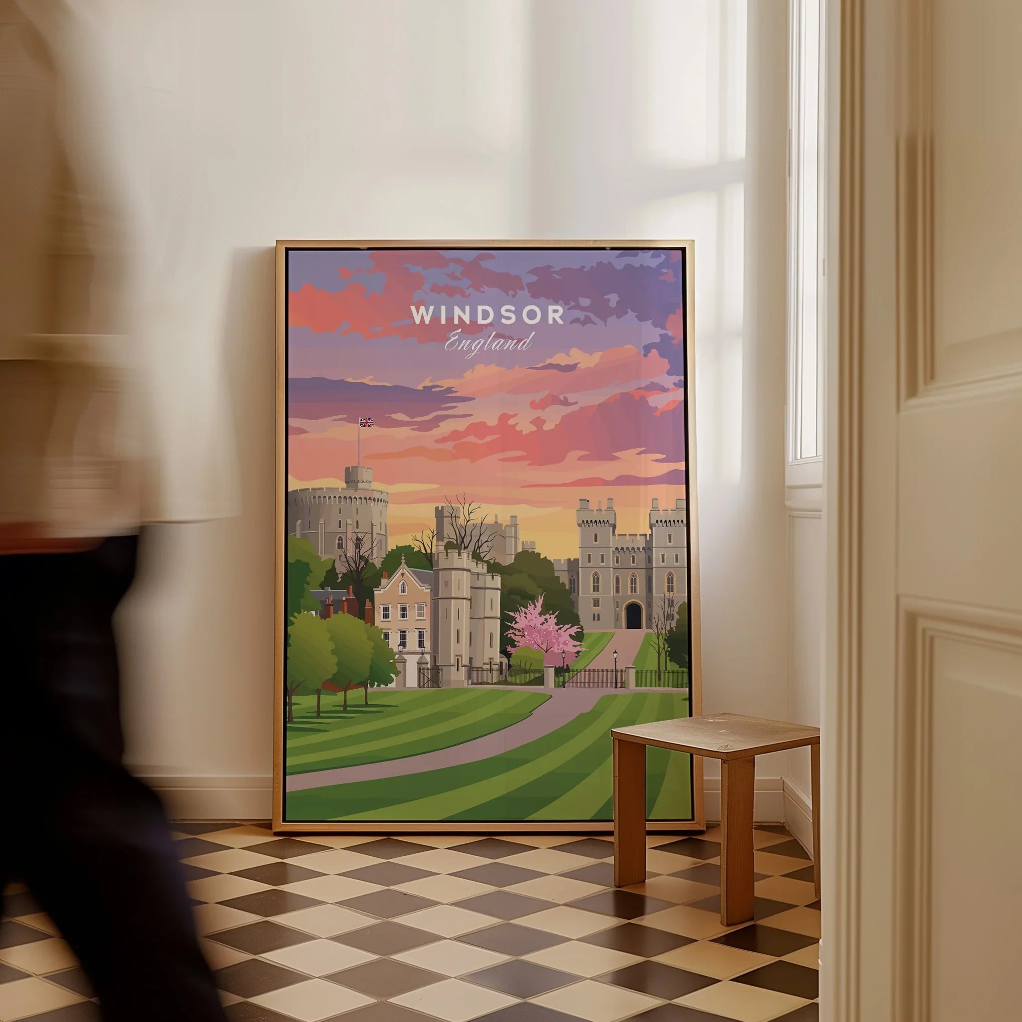 Framed Windsor England travel poster with castle and sunset colors leaning on floor