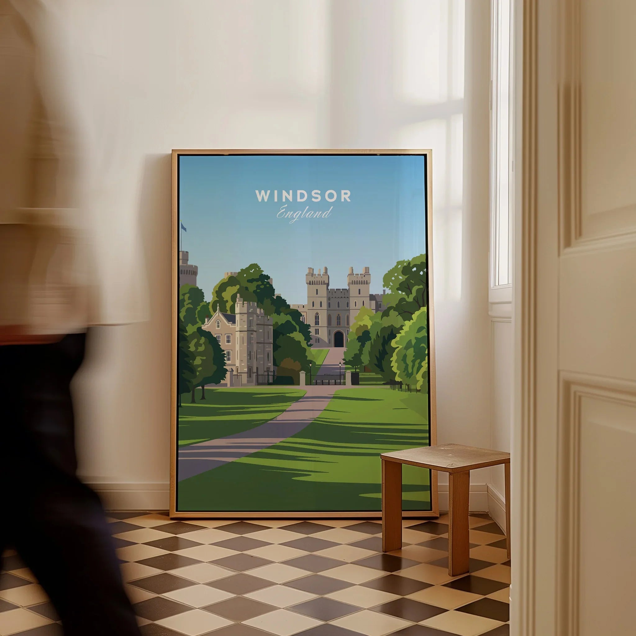 Windsor England travel poster framed on floor, man walking by, modern home decor