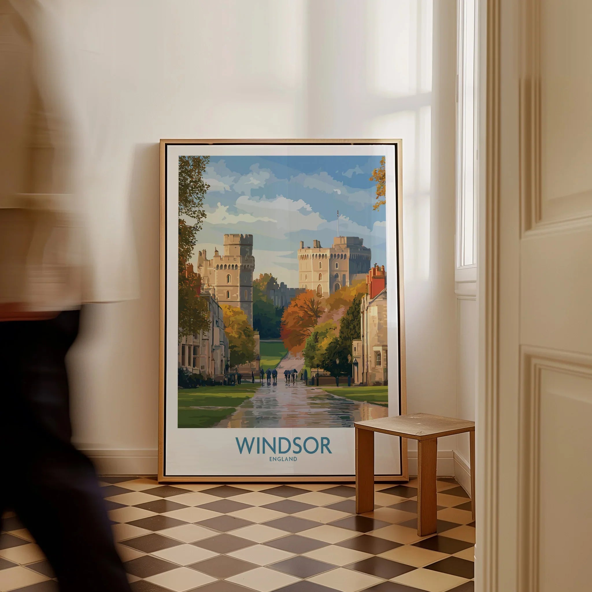 Framed Windsor England travel poster with castle artwork on checkered floor, hallway decor