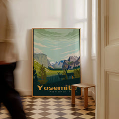 Framed Yosemite National Park travel poster on floor in bright hallway with checkered tiles