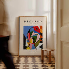 Picasso Geometric Face Abstract Art Print Colorful Cubist Portrait Poster Artwork Collection displayed in a stylish interior.