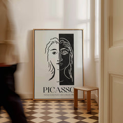 Picasso Portrait Deux Parties Black White Split Face Art Print Poster displayed in a stylish interior, emphasizing minimalist design.