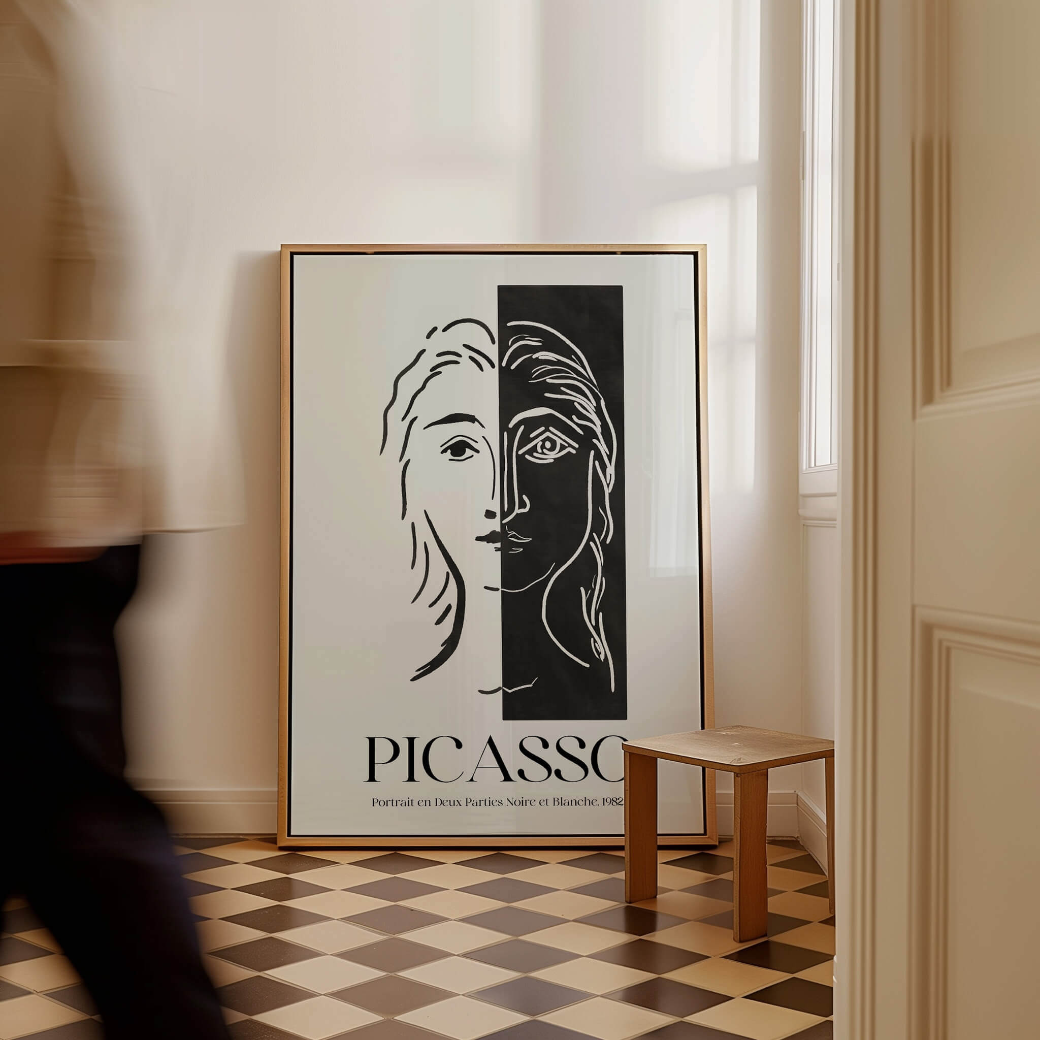 Picasso Portrait Deux Parties Black White Split Face Art Print Poster displayed in a stylish interior, emphasizing minimalist design.