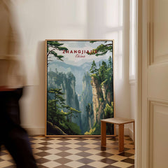 Zhangjiajie China Art Print | Misty Forest Canyon Poster displayed in a stylish room with a person walking past.