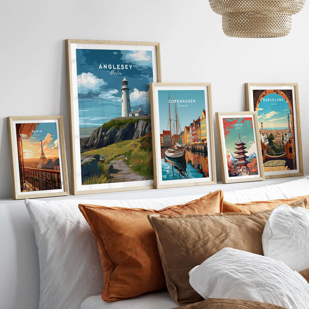 Anglesey Wales lighthouse print on cliffs, coastal path wall art, framed artwork collection in a cozy living room.
