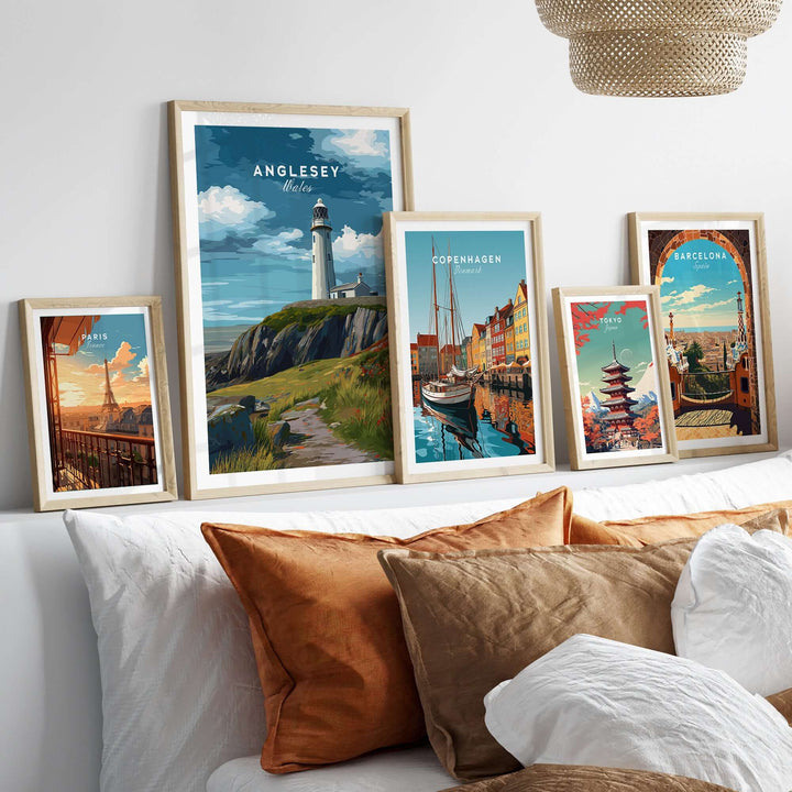 Anglesey Wales lighthouse print on cliffs, coastal path wall art, framed artwork collection in a cozy living room.