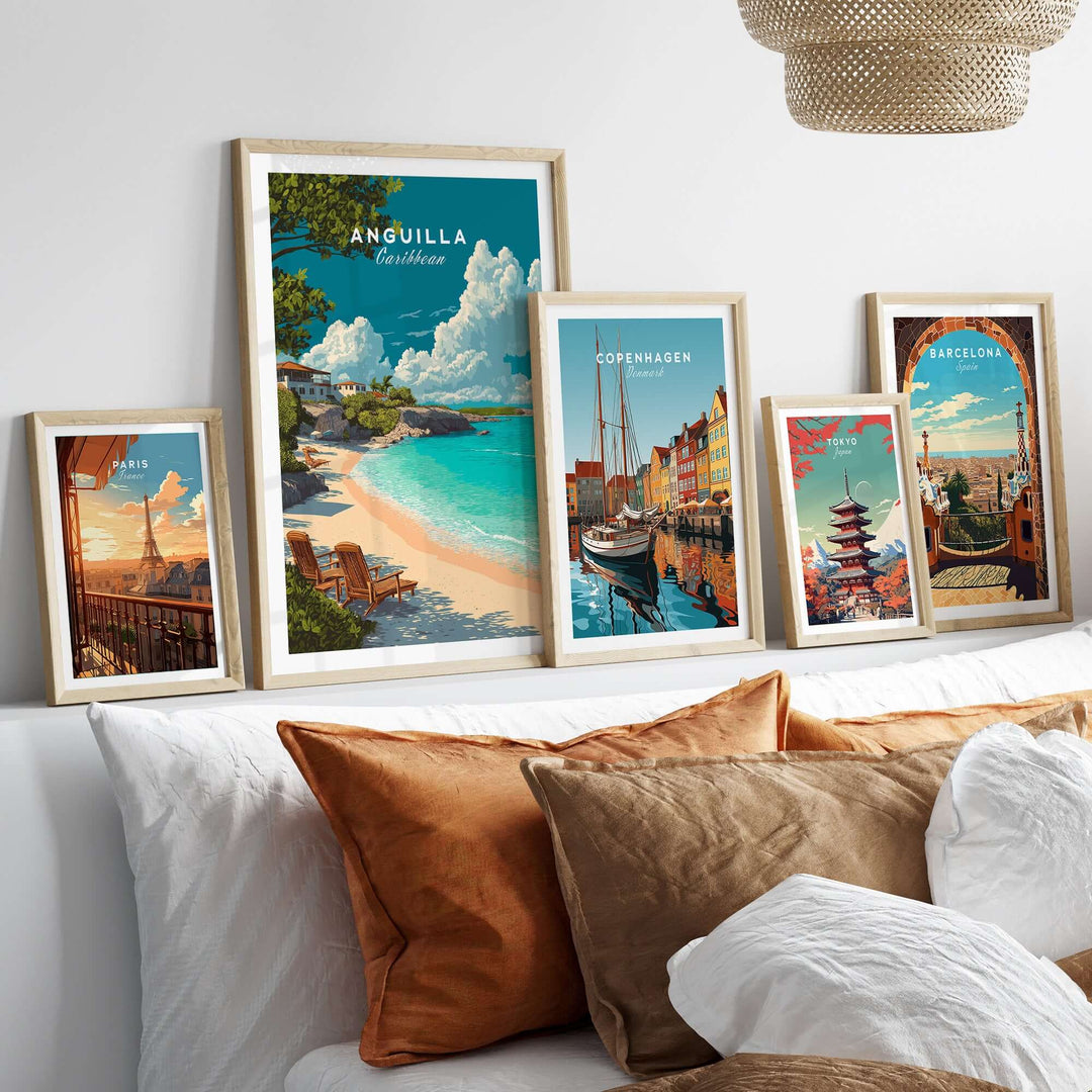 Framed Anguilla Caribbean beach print among other travel artworks in a cozy living room setting.