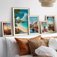 Anguilla Caribbean Beach Print displayed among other travel artwork in a stylish home interior setting.