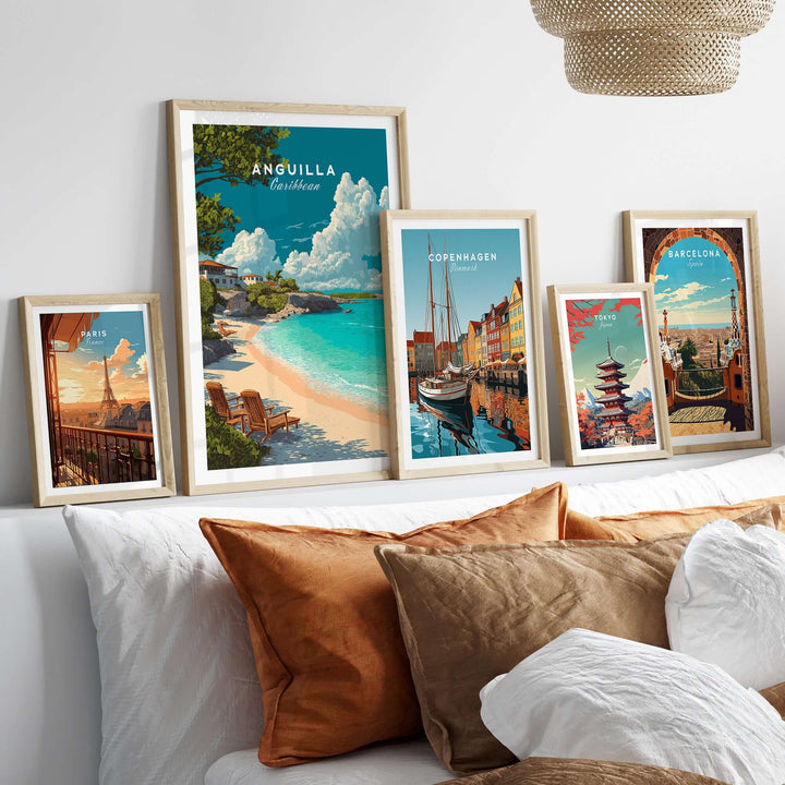 Framed Anguilla Caribbean beach print among other travel artworks in a cozy living room setting.