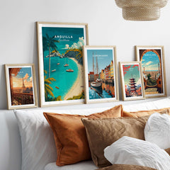 Anguilla Travel Poster -  Caribbean Wall Art displayed among other travel posters in a stylish home setting.