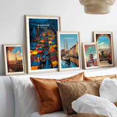 Bangkok Thailand Night Market Overhead Poster - Bustling Street Scene Print displayed among framed travel posters.