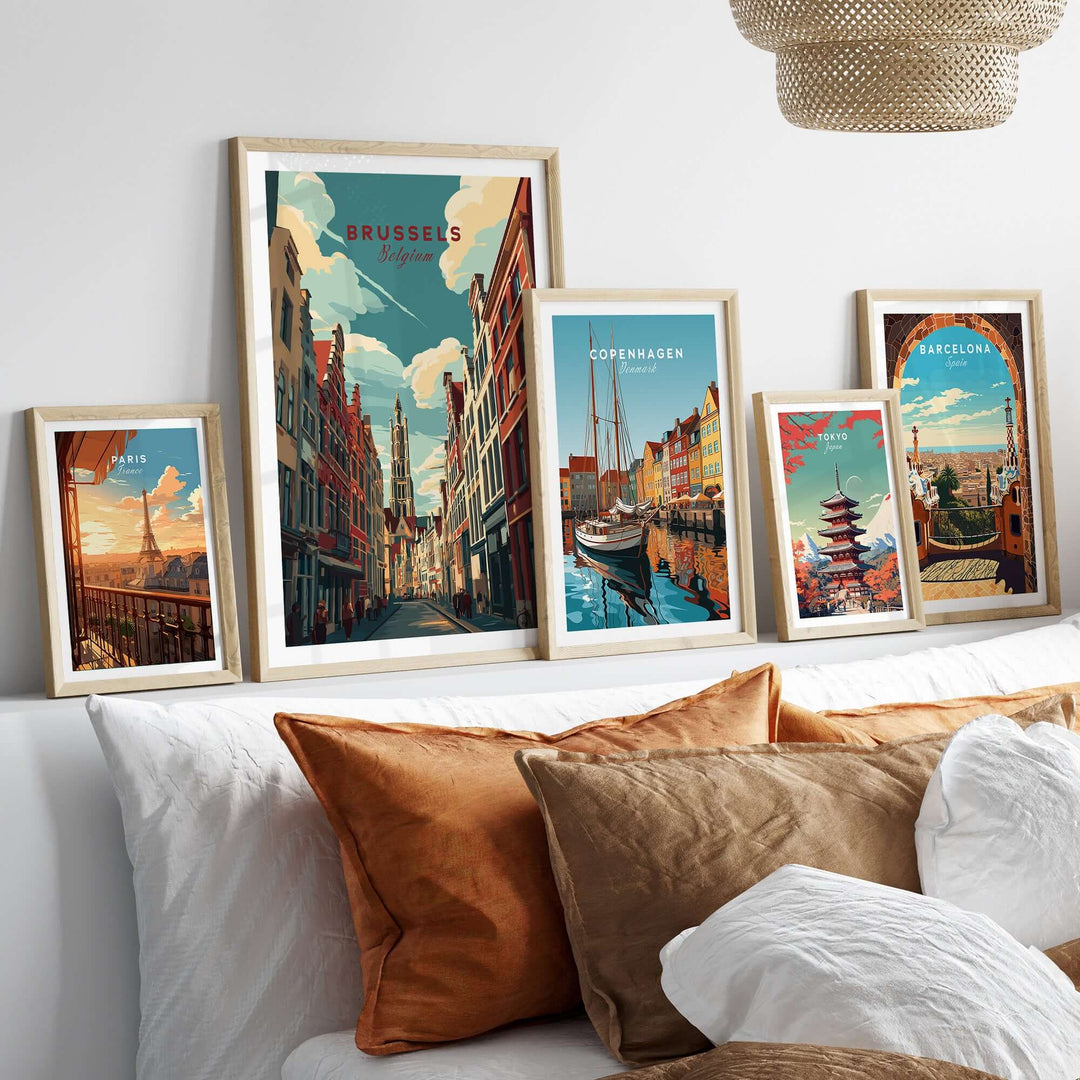 Brussels Belgium Grand Place artwork framed on a bed with decorative pillows showcasing iconic cityscapes.