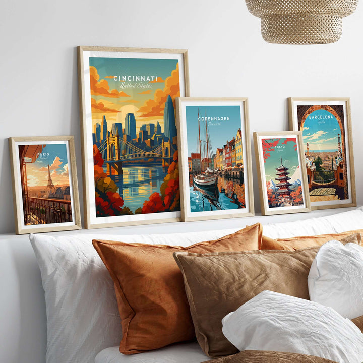 Framed Cincinnati Sunset River Reflection poster with city skyline and bridge, displayed with other city art prints.