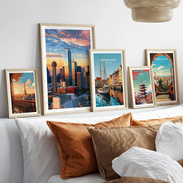 Dallas Texas skyline poster among framed cityscape artwork on a stylish sofa, showcasing urban elegance.