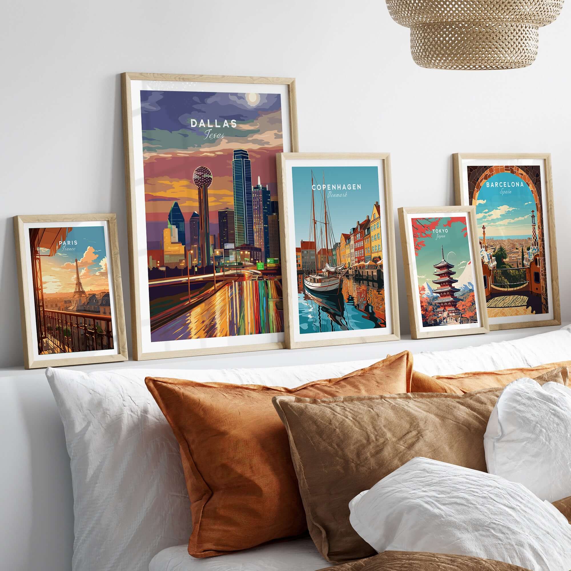 Dallas Texas Highway Night Lights Poster - Illuminated Skyline Print displayed among other city posters on a cozy sofa.