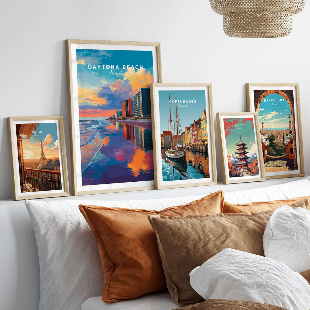 Daytona Beach sunset skyline print and travel art framed on a stylish bed, adding vibrant decor to any room.