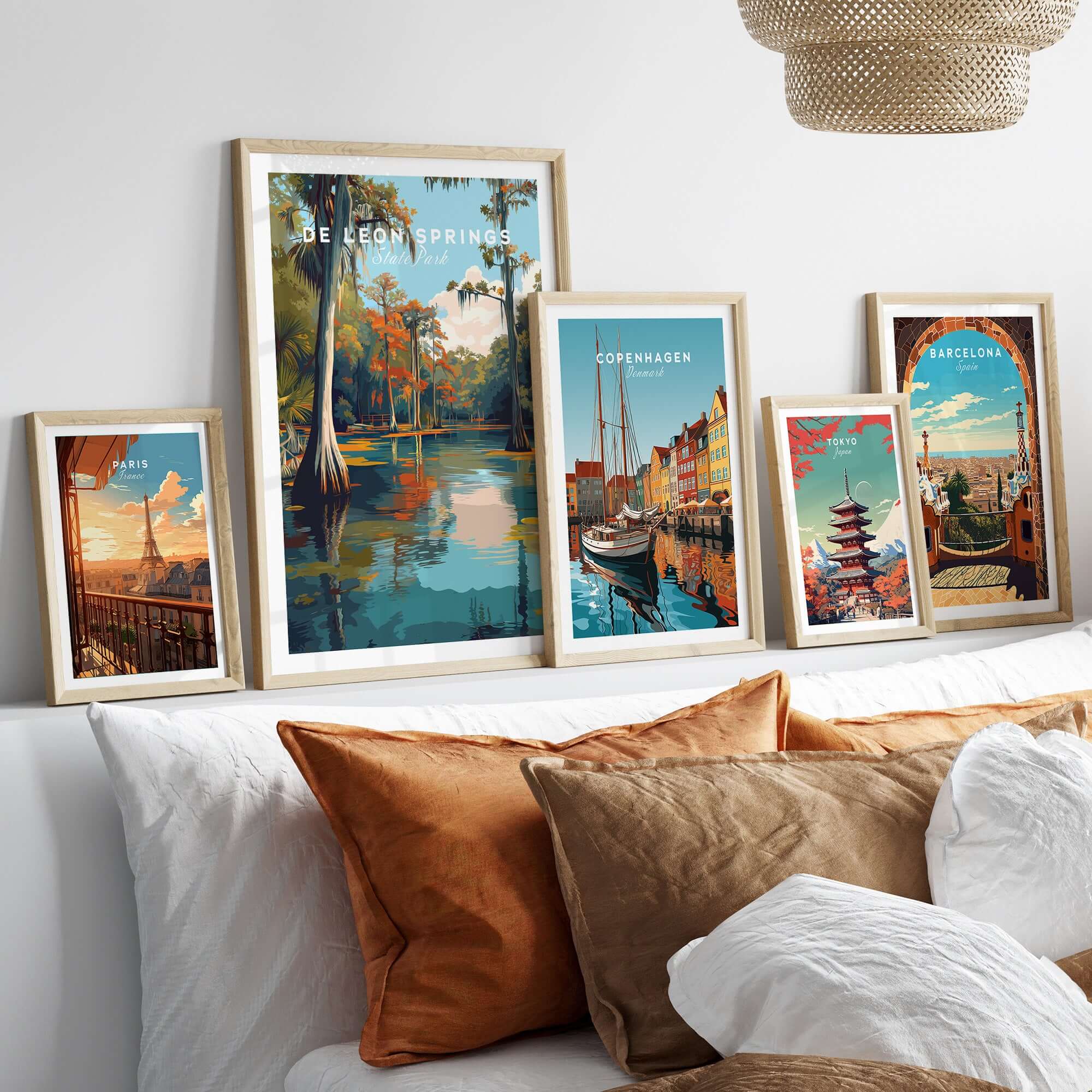 De Leon Springs Poster - Serene Florida State Park Wall Art displayed among other travel posters on a cozy couch.