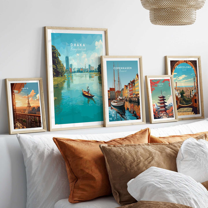 Dhaka city view poster showcasing waterfront art among framed prints in a cozy home setting.