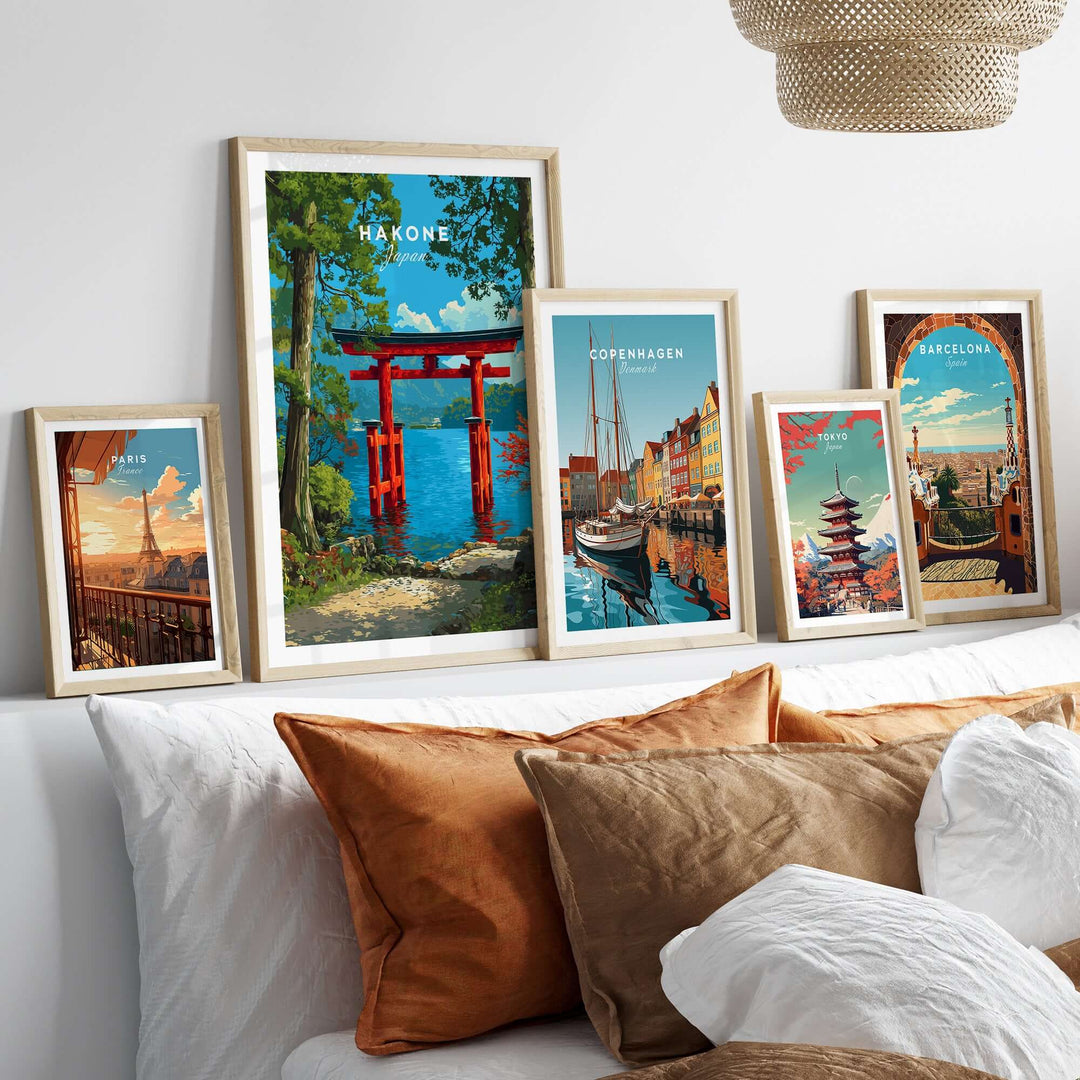 Gallery of framed travel posters including Hakone Japan Lake Ashi Torii Gate and iconic sights from Copenhagen and Barcelona.