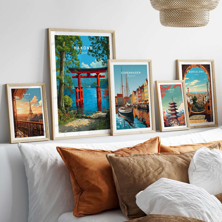 Gallery of framed travel posters including Hakone Japan Lake Ashi Torii Gate and iconic sights from Copenhagen and Barcelona.