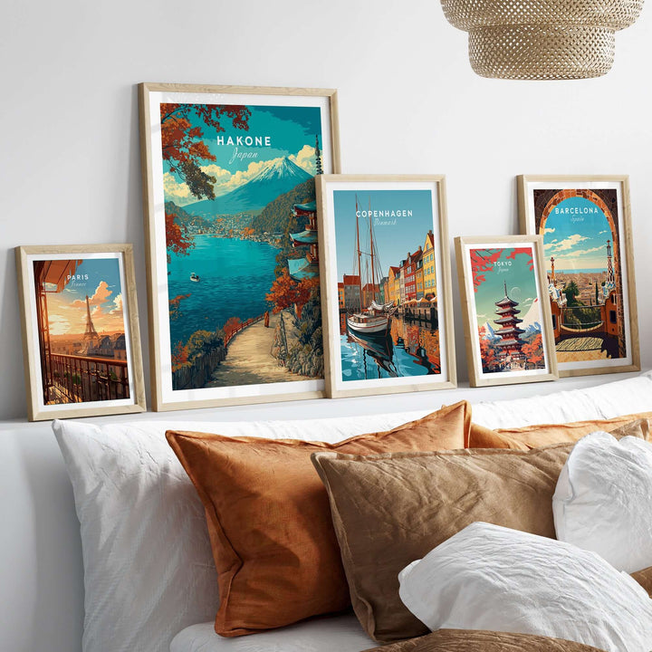 Gallery of framed scenic posters including Hakone Lake view with pagoda and Mount Fuji, alongside prints of Copenhagen and Barcelona.