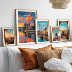 Hiroshima Japan Sunset Poster - Vibrant Sky Wall Art displayed among other city posters on a stylish wall.