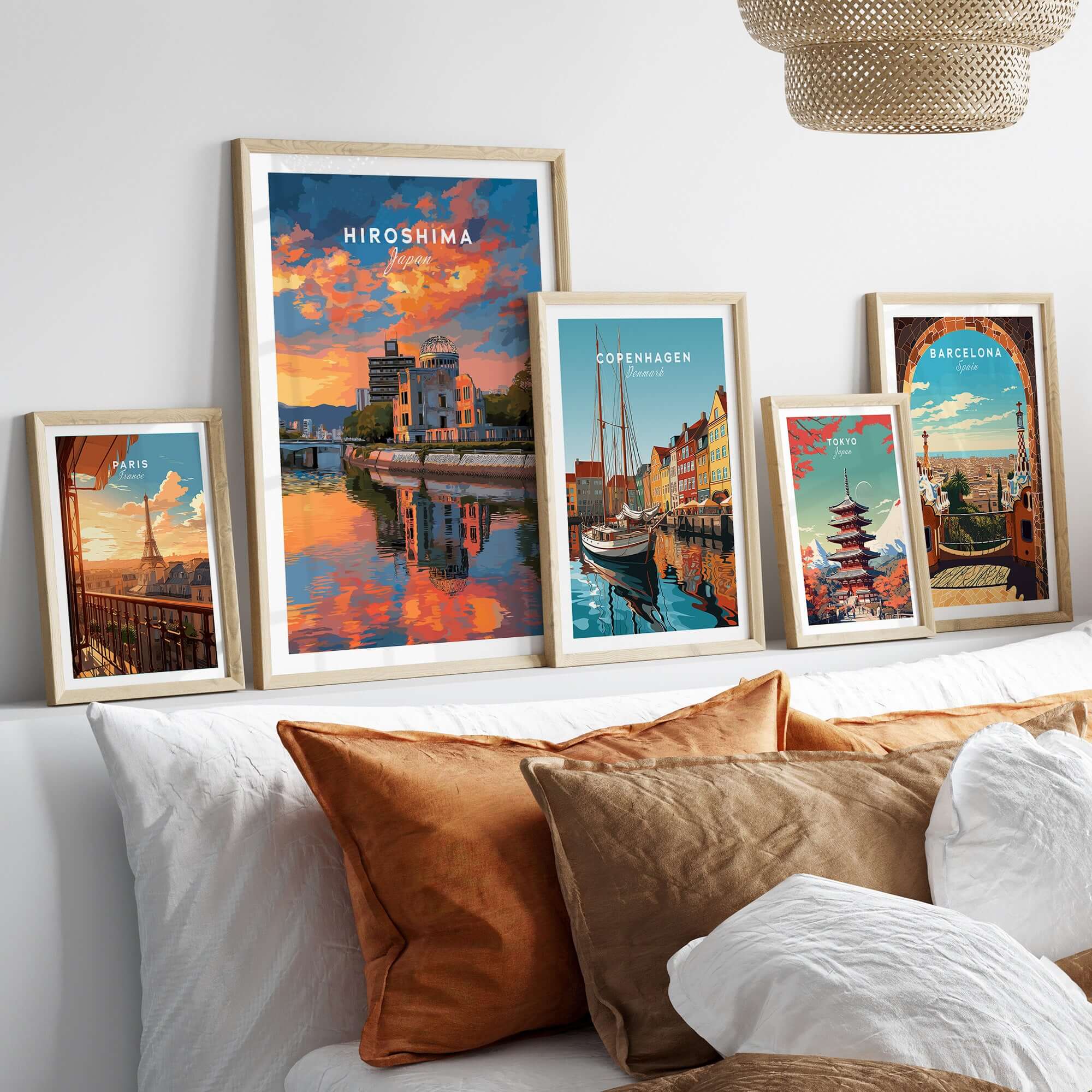 Hiroshima Japan Sunset Poster - Vibrant Sky Wall Art displayed among other city posters on a stylish wall.