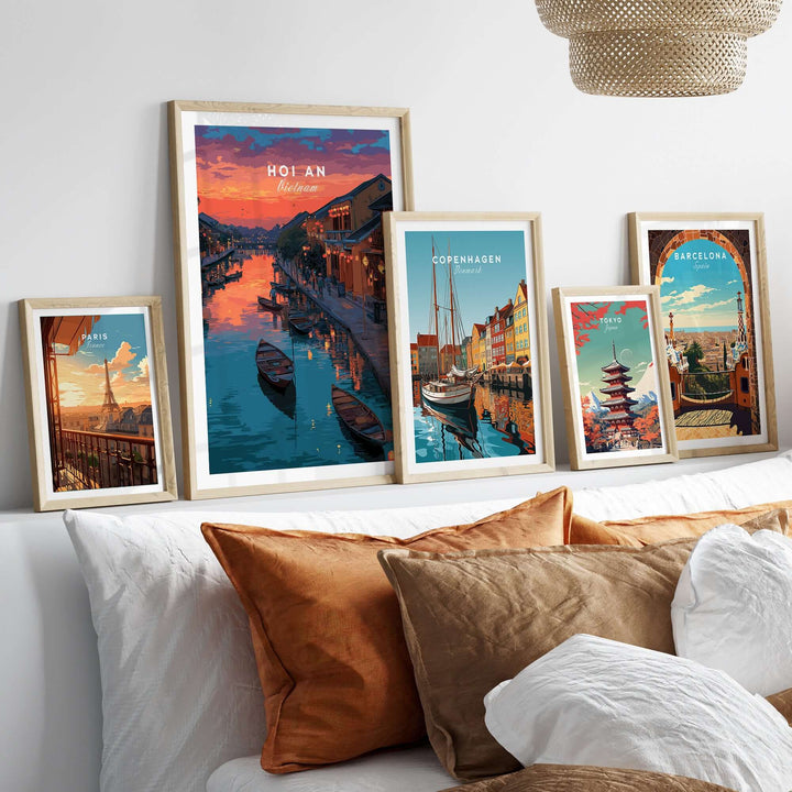 Hoi An Vietnam poster among framed travel art, showcasing vibrant colors and historic architecture.