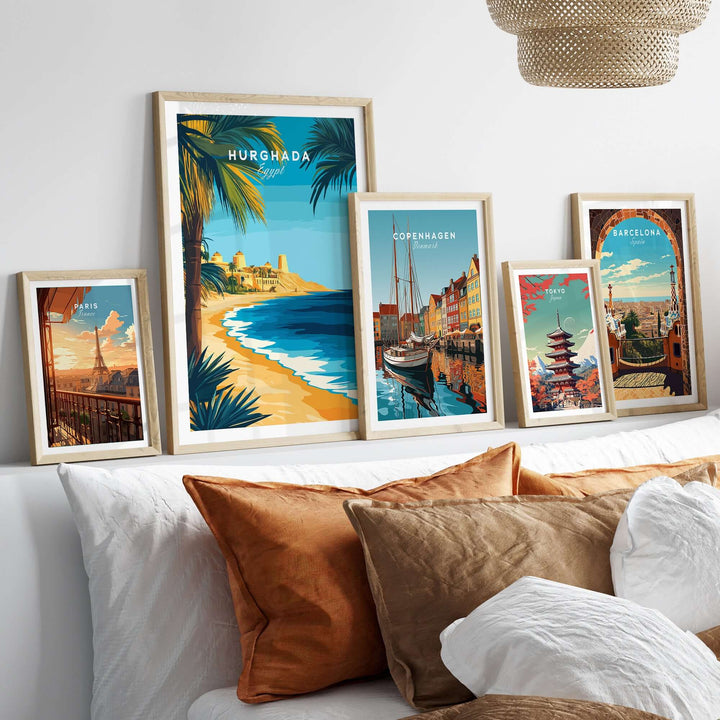 Hurghada Egypt beach poster alongside travel prints from Copenhagen, Barcelona, and other cities on a stylish shelf.