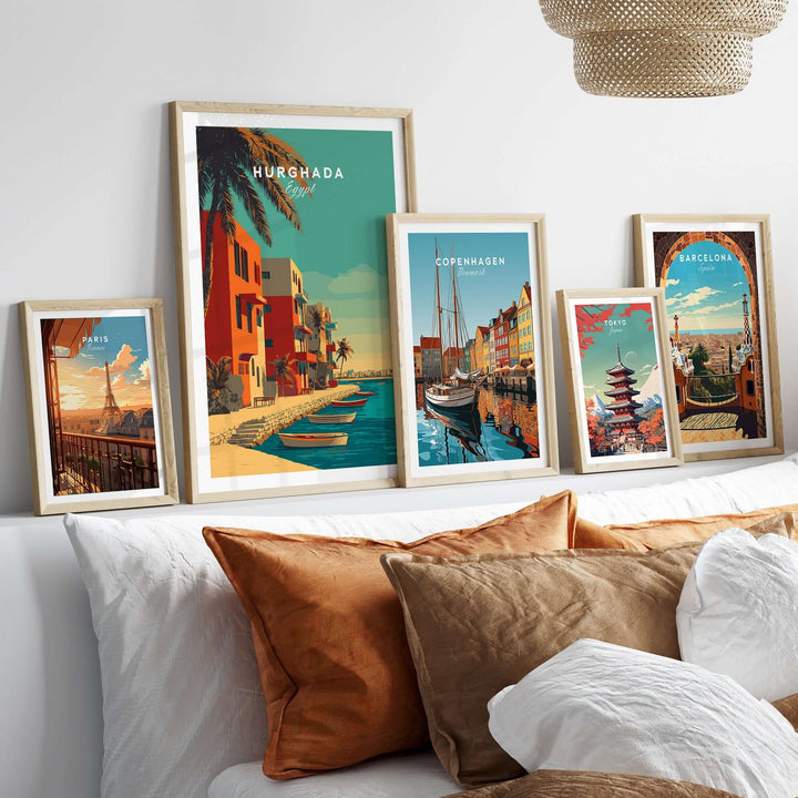 Display of framed travel posters, including a vibrant Hurghada Egypt print and scenic views from Copenhagen and Barcelona.