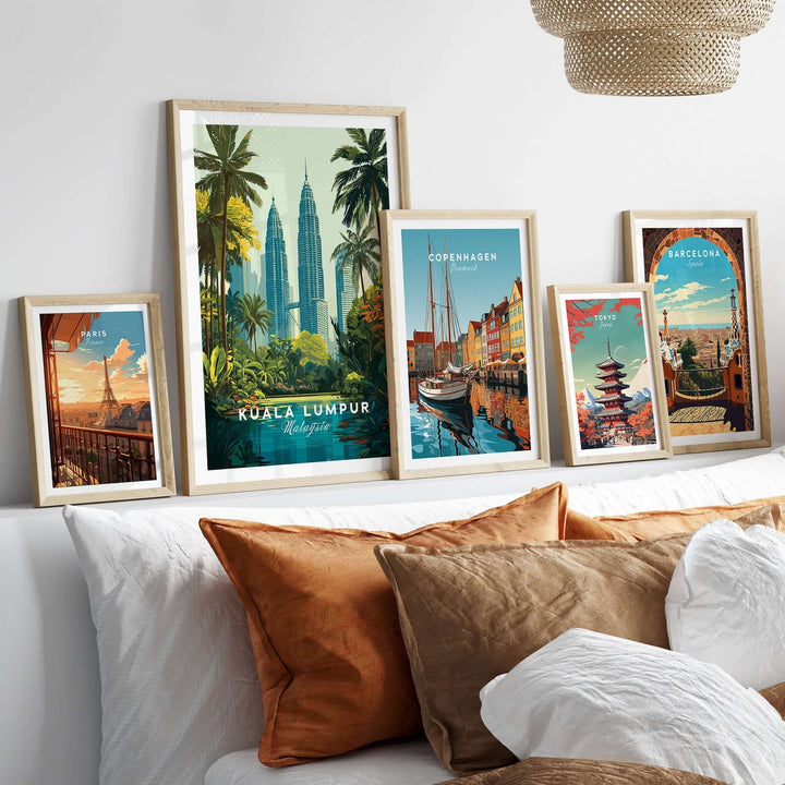 Framed posters of Kuala Lumpur Twin Towers and other cityscapes, adding a vibrant touch to a cozy living space.