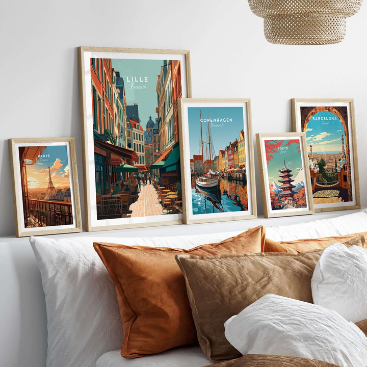 Framed posters featuring Lille, Copenhagen, and Barcelona, showcasing vibrant European cityscapes.