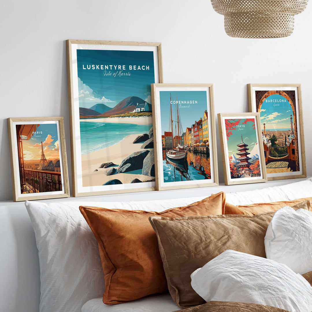 Luskentyre Beach print surrounded by coastal and city posters on a stylish wall decor above a cozy sofa.