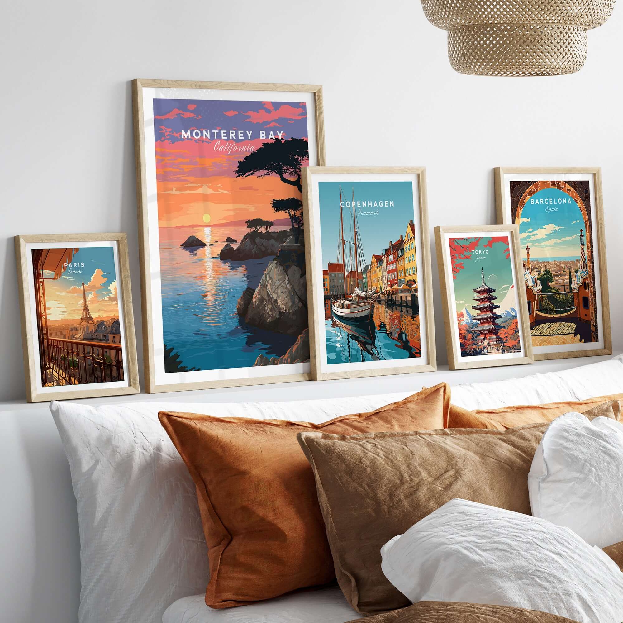 Monterey Bay Print California - Pacific Grove Wall Art displayed among other city prints on a cozy bed setting.