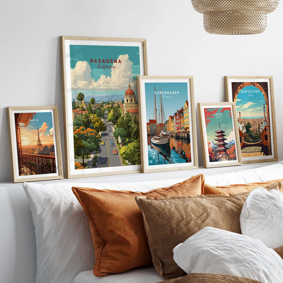 Framed cityscape posters including Pasadena, Copenhagen, and Barcelona on a decorative wall.