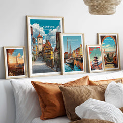 Rothenburg Poster Germany Travel Print showcased among other travel posters in a cozy interior setting.