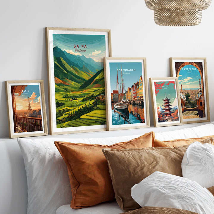 Vibrant Sa Pa Vietnam poster amidst framed art prints, showcasing rice terraces and lush green mountains.