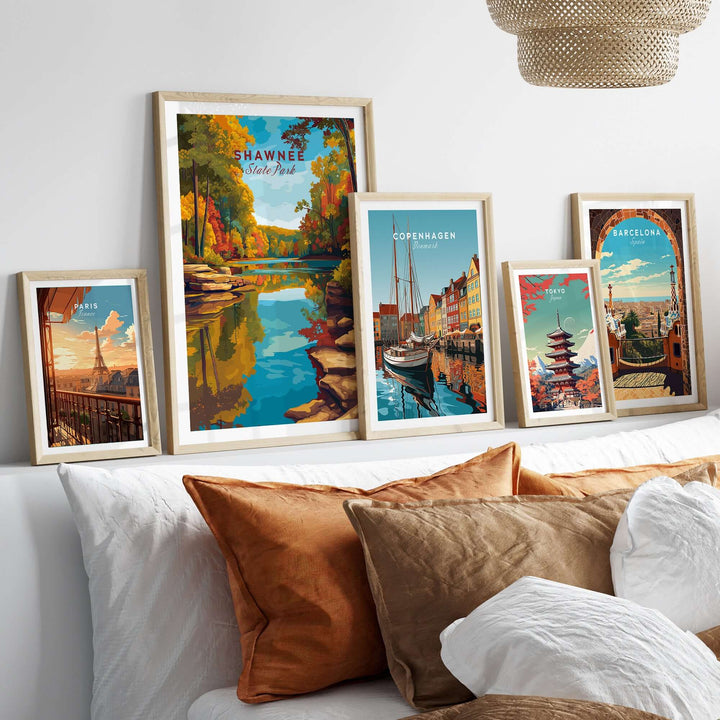 Shawnee State Park Ohio autumn landscape print with framed travel posters on a cozy bed.