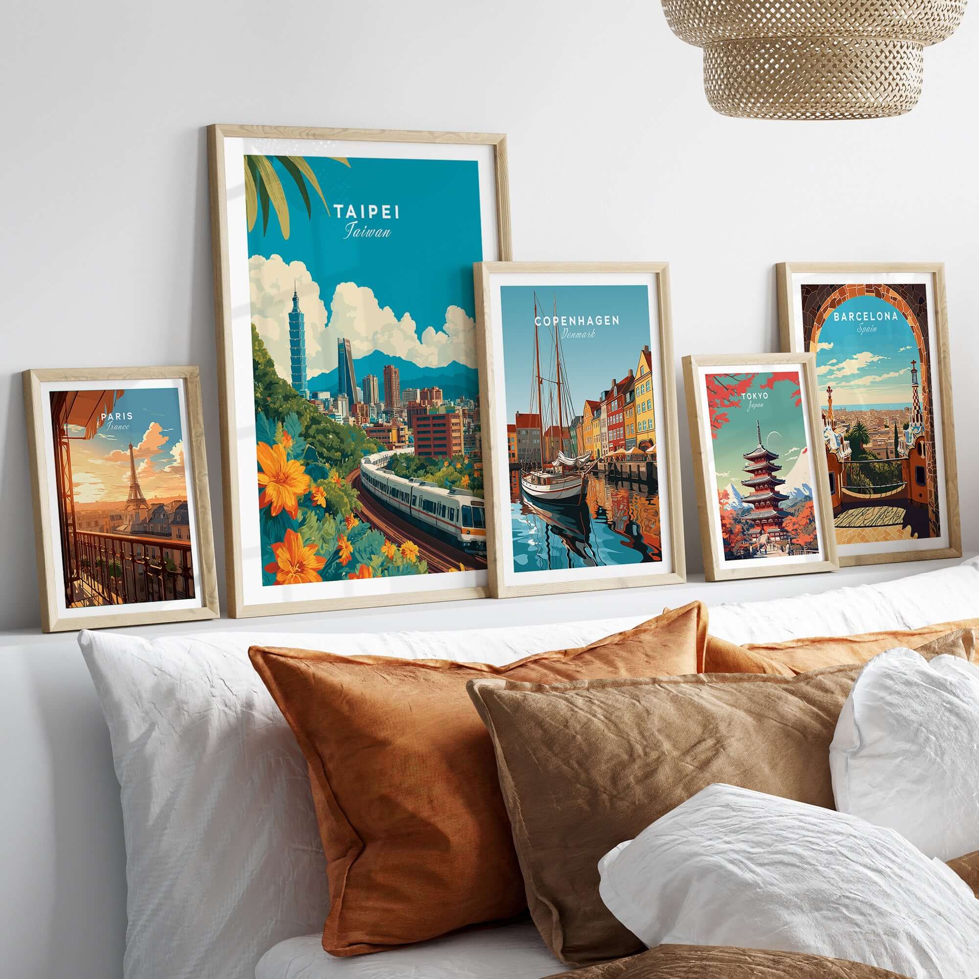 Taipei Print Taiwan City Skyline MRT Train Poster - Urban Landscape Wall Art displayed among framed art on a stylish couch.