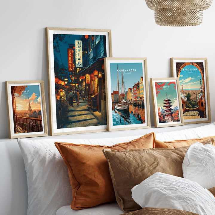 Taipei Taiwan Lantern Alley print among wall art of Copenhagen and Barcelona, styled over a cozy sofa.