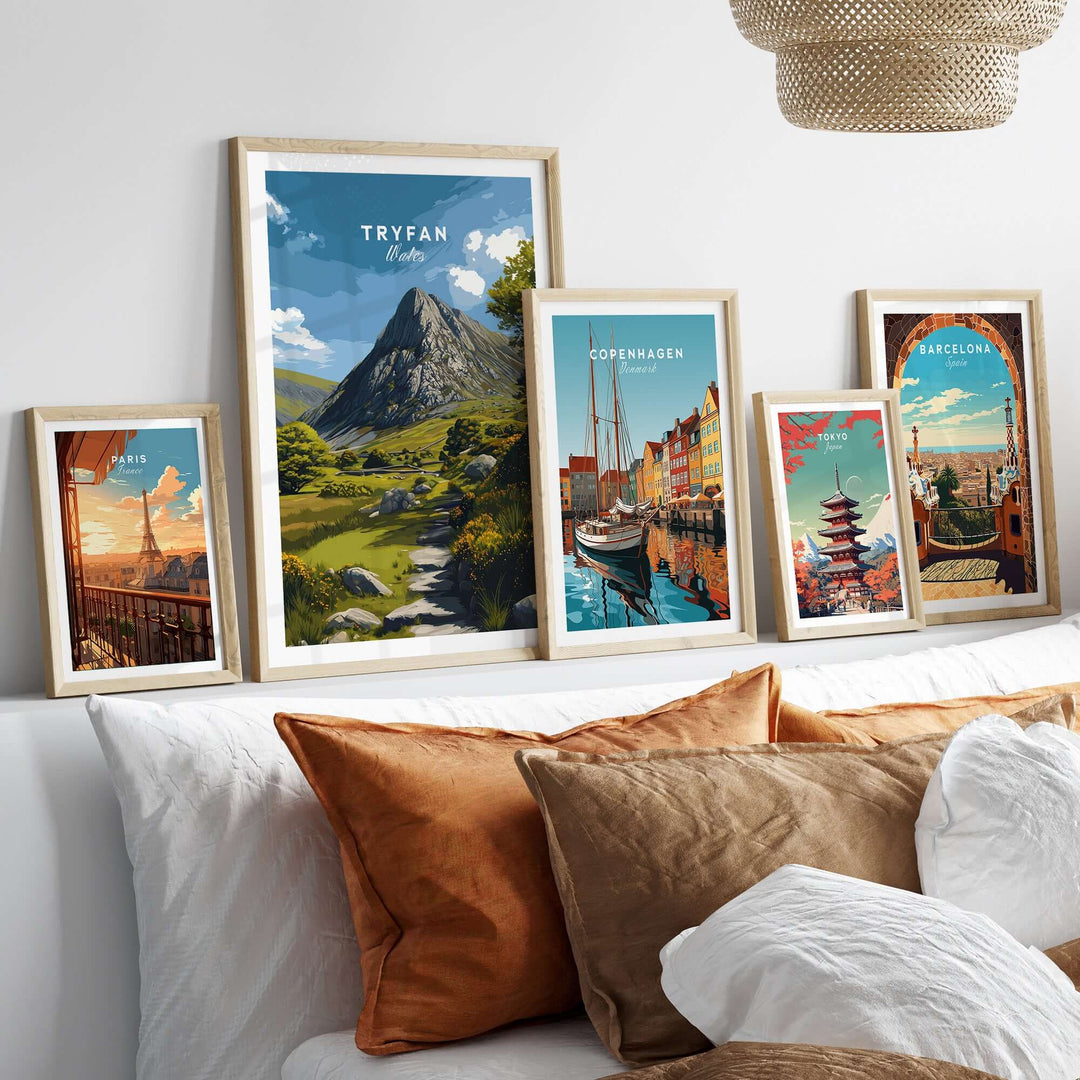 Tryfan poster and scenic prints from Copenhagen and Barcelona displayed on a cozy living room wall.