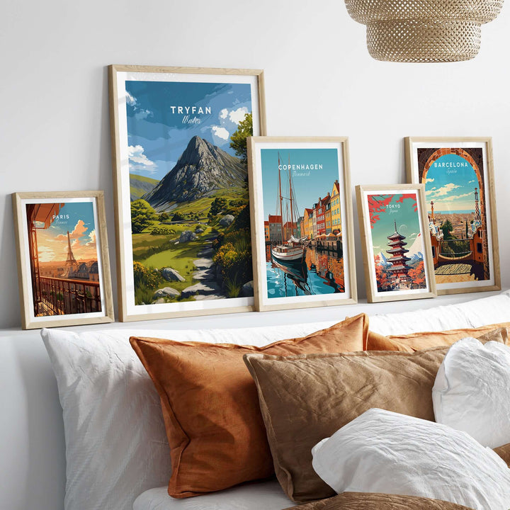 Tryfan poster and scenic prints from Copenhagen and Barcelona displayed on a cozy living room wall.